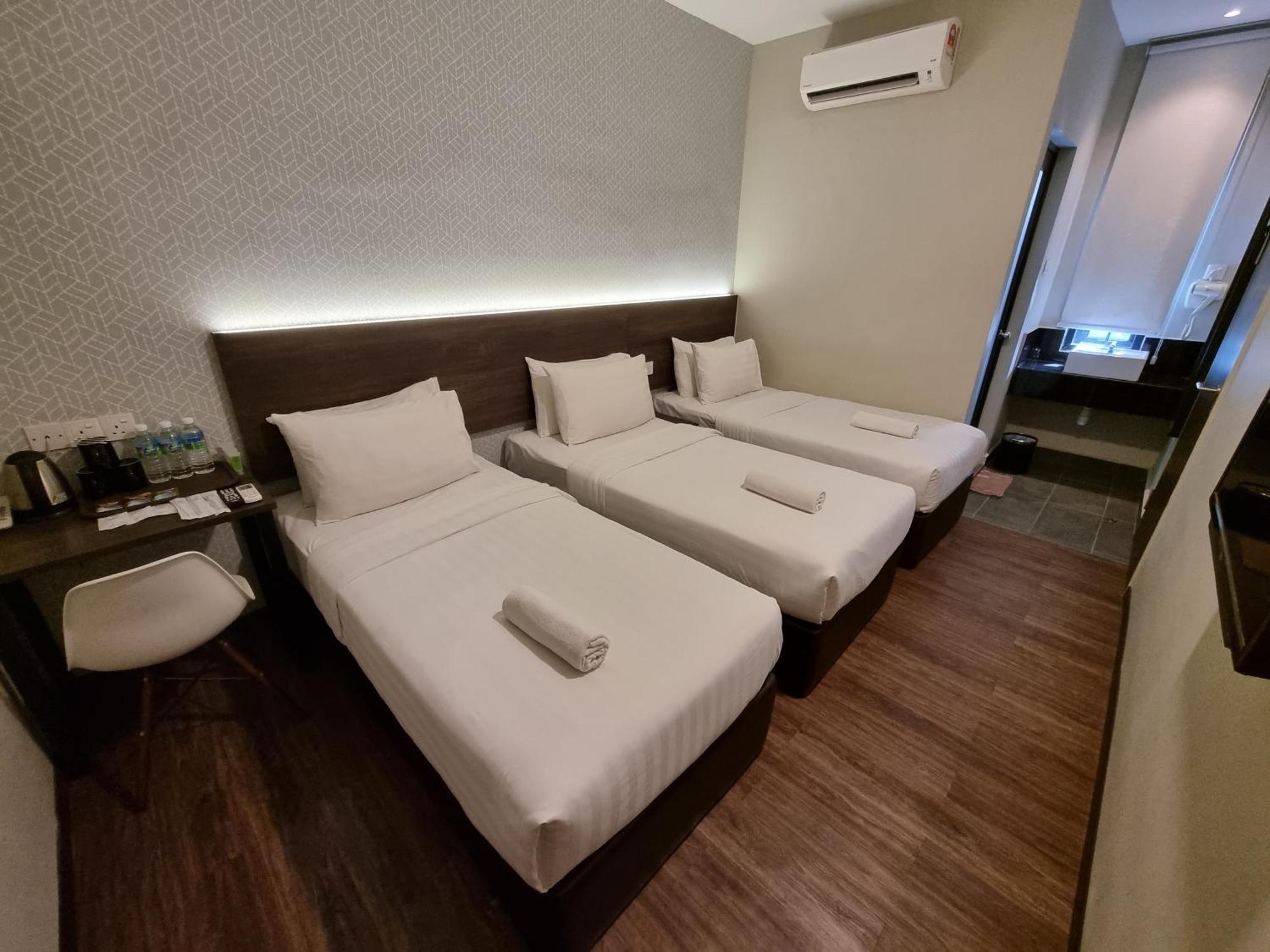 The Square Hotel Skudai Buitenkant foto